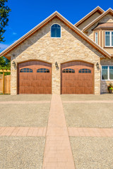 Fototapeta premium Fragment of a luxury house with a garage door in Vancouver, Canada.