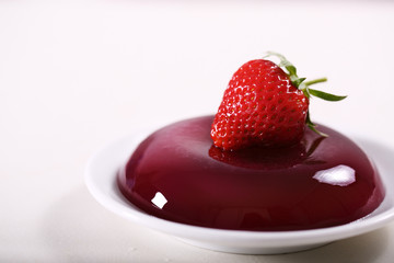 Strawberry jelly with fresh strawberries