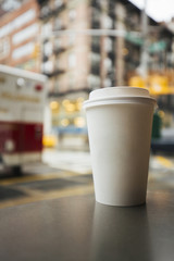 Coffee cup in city coffee shop.
