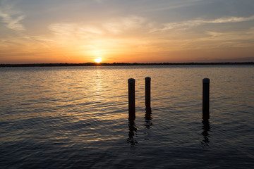 Fototapeta na wymiar Sunset in lake at Martin Dies state park, Texas