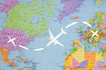 Fototapeta na wymiar Flight to the USA symbolic image of travel by plane map