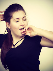 Naklejka premium Young tired woman yawning