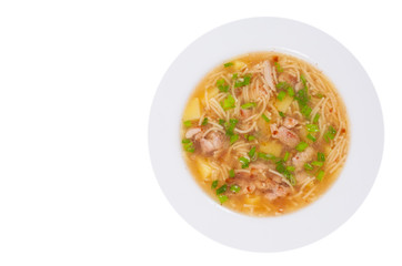  chicken soup with noodle and vegetables. top view. isolated on white