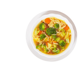 Fresh vegetable soup with noodles. top view. isolated on white