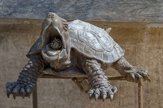 Stone Turtle statue. Detail from the baroque fountain of the Castle of Ludwig The Bavarian on Island Herreninsel, Chiemsee, Bavaria, Germany.