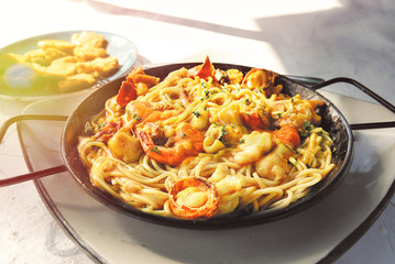 Seafood pasta. Spaghetti with Clams, Prawns, Seafood Cocktail. Dominican Republic