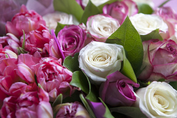 the Bouquet of pink rose and red tulips  for the bride