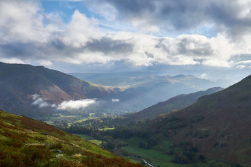 Looking down the trail towards Patterdale and Glenridding that leads up to the Hole in the Wall below Helvellyn in the Lake District, England, UK.