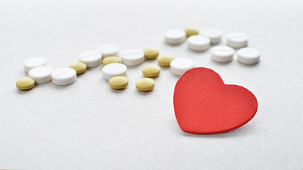colored tablets with red heart