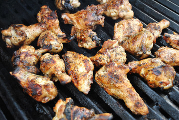 Chicken Wing Pieces on a Hot Summer Grill