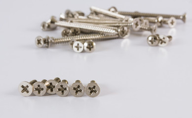 Close up screw pile on white background