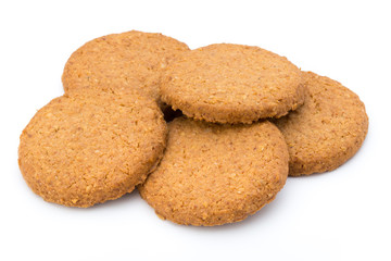 Stacked short pastry cookies isolated on white background.