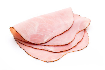 Thin slices of ham on white background.