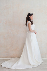 Fototapeta premium beautiful bride posing wedding hairstyle and dress