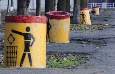 Trash bins in the alley of the city park