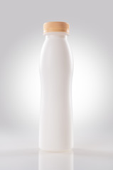 White plastic bottle with cap. File contains clipping paths.