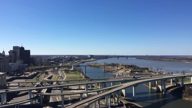 Traffic moves along Interstate 40 crossing the Mississippi in Memphis, Tennessee, USA.