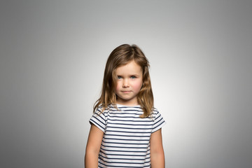 Studio portrait of a girl contemplating