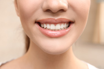 Smiling young woman, closeup