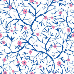 Vector navy blue, pink, and white blooming sakura bracnhes painted texture. Seamless repeat pattern background. Great for wallpaper, cards, fabric, wrapping paper, stationery projects.
