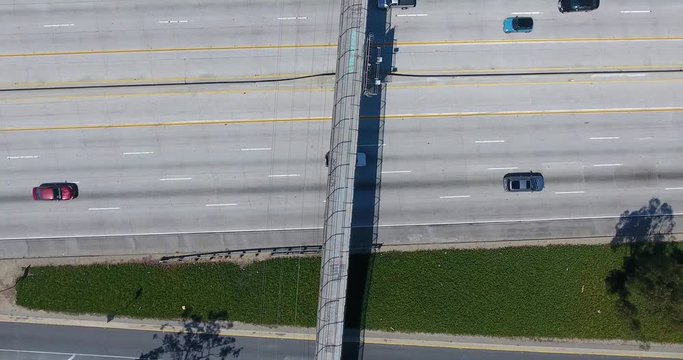 Direct overhead aerial shot of a pedestrian walkway 4k 24fps