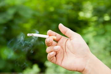 Pile of cigarette butts ,root to be the lung cancer