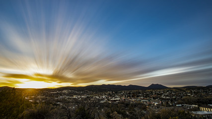 Sunset over a small mountain town in the desert
