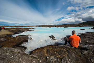 Fototapeta na wymiar Business man at the Blue lagoon, Iceland