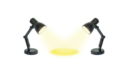 Closeup two small lamp with yellow light shine to the center isolated on white background