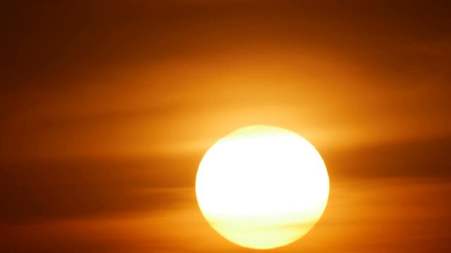Big sun disk sunset close timelapse