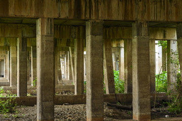 Fototapeta na wymiar Way u-turn under bridge with bridge pillar