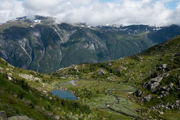 Naklejka na ściany i meble Norway - mountain lake in fjord