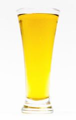 Big glass of beer on a white background close-up.