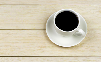 Obraz na płótnie Canvas coffee cup on wooden background, coffee break