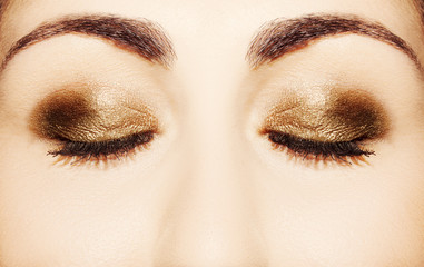 Fototapeta premium Eye Makeup. Beautiful Eyes Glitter Make-up. Holiday Makeup detail.