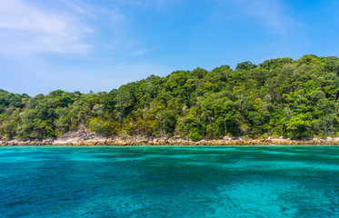 Fototapeta na wymiar Rocky coastline of Tachai island. Seascape view in Andaman sea, Phang Nga, Thailand, Southeast Asia.