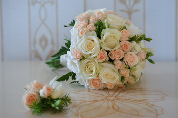 Wedding boutonniere and bouquet. Accessories of the bride and groom