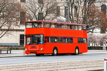 Fototapeta na wymiar red double decker tourist bus on the europe street