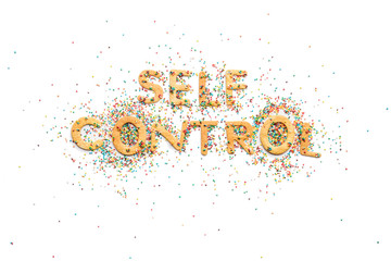 Top view of self control lettering made from sweets isolated on white, healthy living concept
