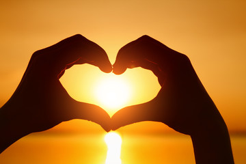 hands in the form of heart