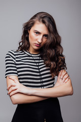 Fototapeta premium Fashion portrait pretty sweet young woman over grey background