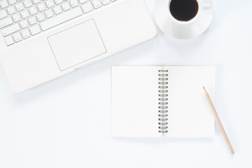 Empty notebook with white computer laptop and coffee cup, Workspace concept