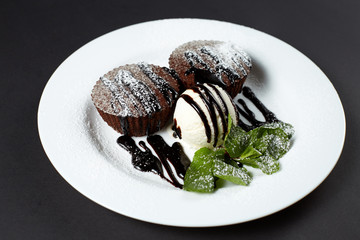 Chocolate fondant with ice cream. Dessert.