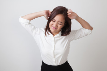 Sleepy young Asian woman yawn.