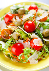 Mixed salad on black slate.