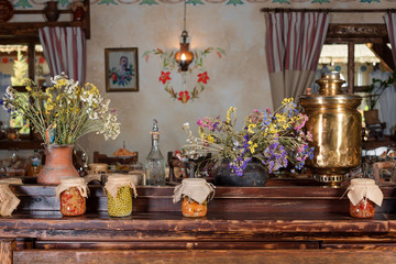 Unique ethnic restaurant interior. Traditional design. Ukrainian rural style and decorations....