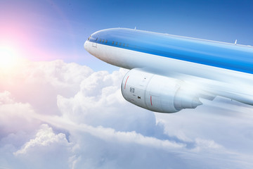 Fototapeta na wymiar Airplane surfing the sky . Mixed media