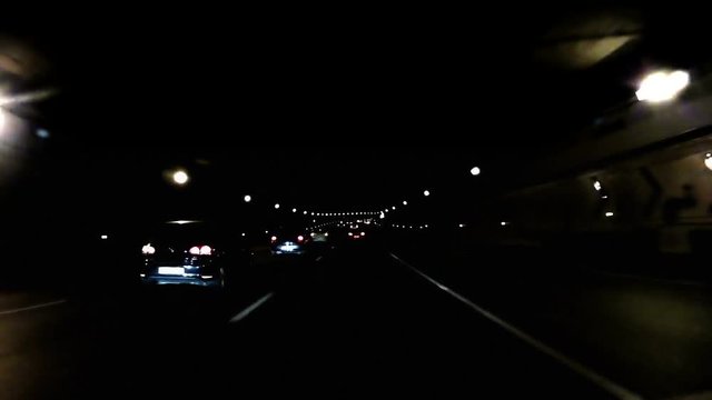 Night Car Trip on a tunnel in Paris peripheral beltway
