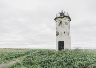 Old lighthouse in summer.