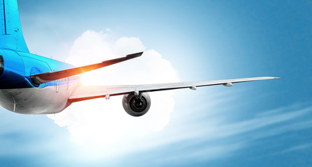 Fototapeta premium Airplane surfing the sky . Mixed media
